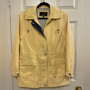 London Fog Yellow zippered raincoat with blue highlights and detachable hood.